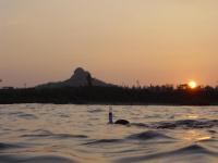 black shadow is Mt.Gusuku and snorkeling friend